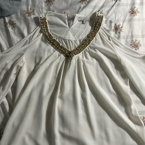 Elegant Cream Blouse with Gold Details